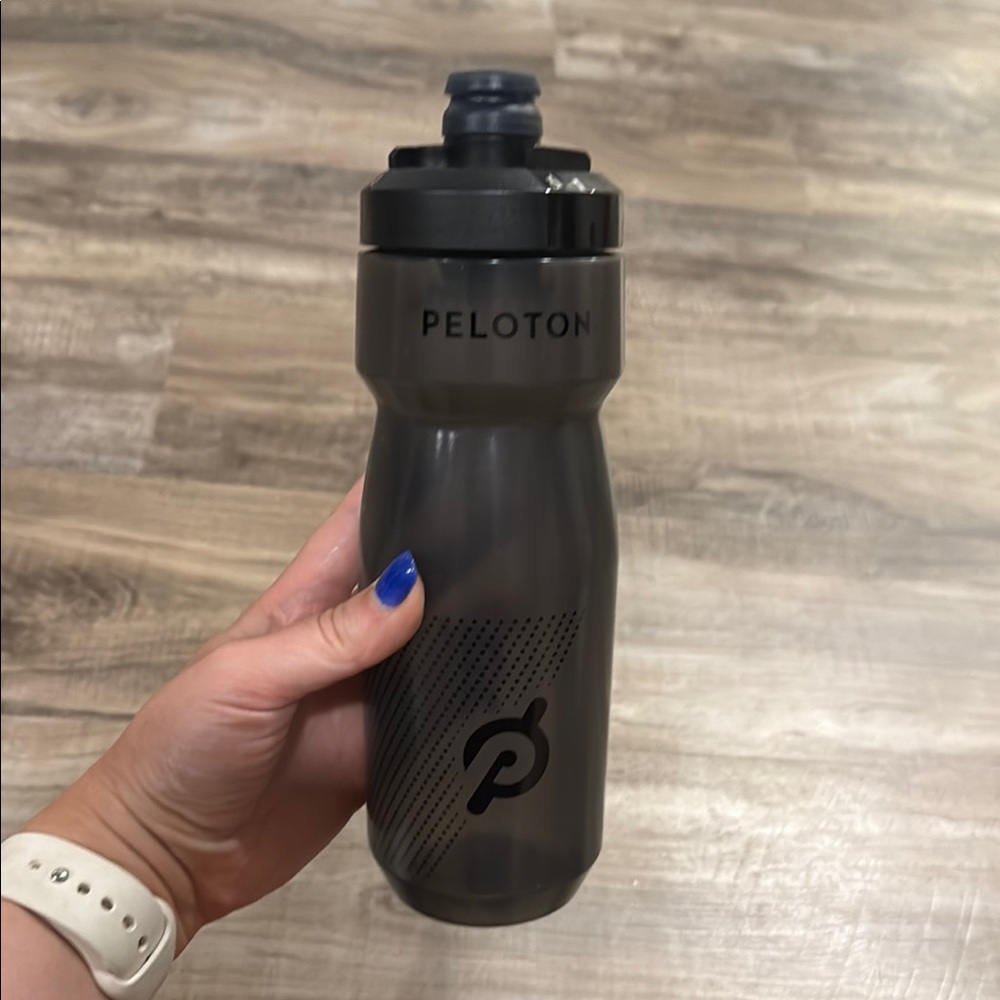 Never used Peloton Charcoal Gray camelback Water Bottle